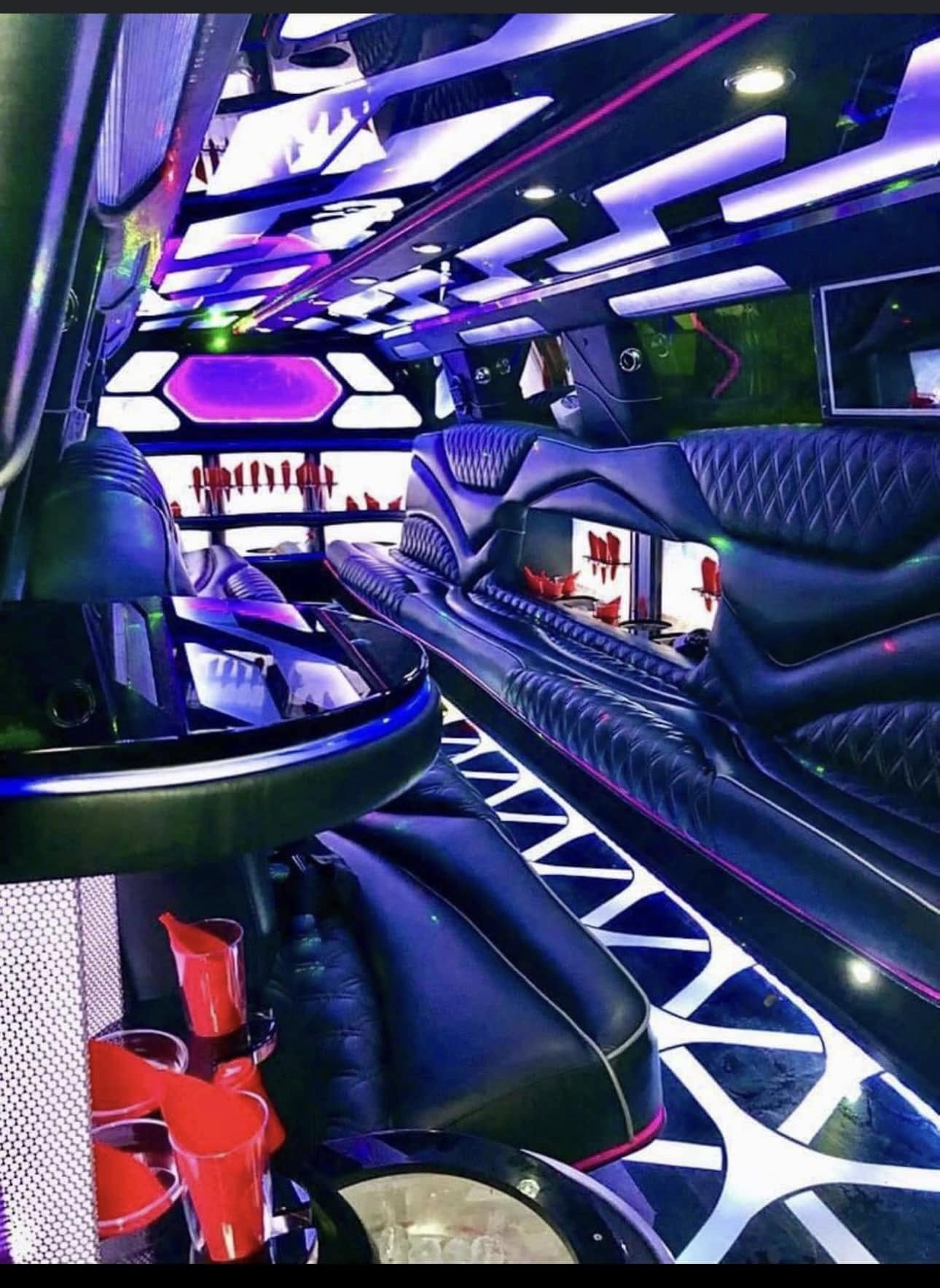 Stretch limousine interior with LED lighting and leather seating